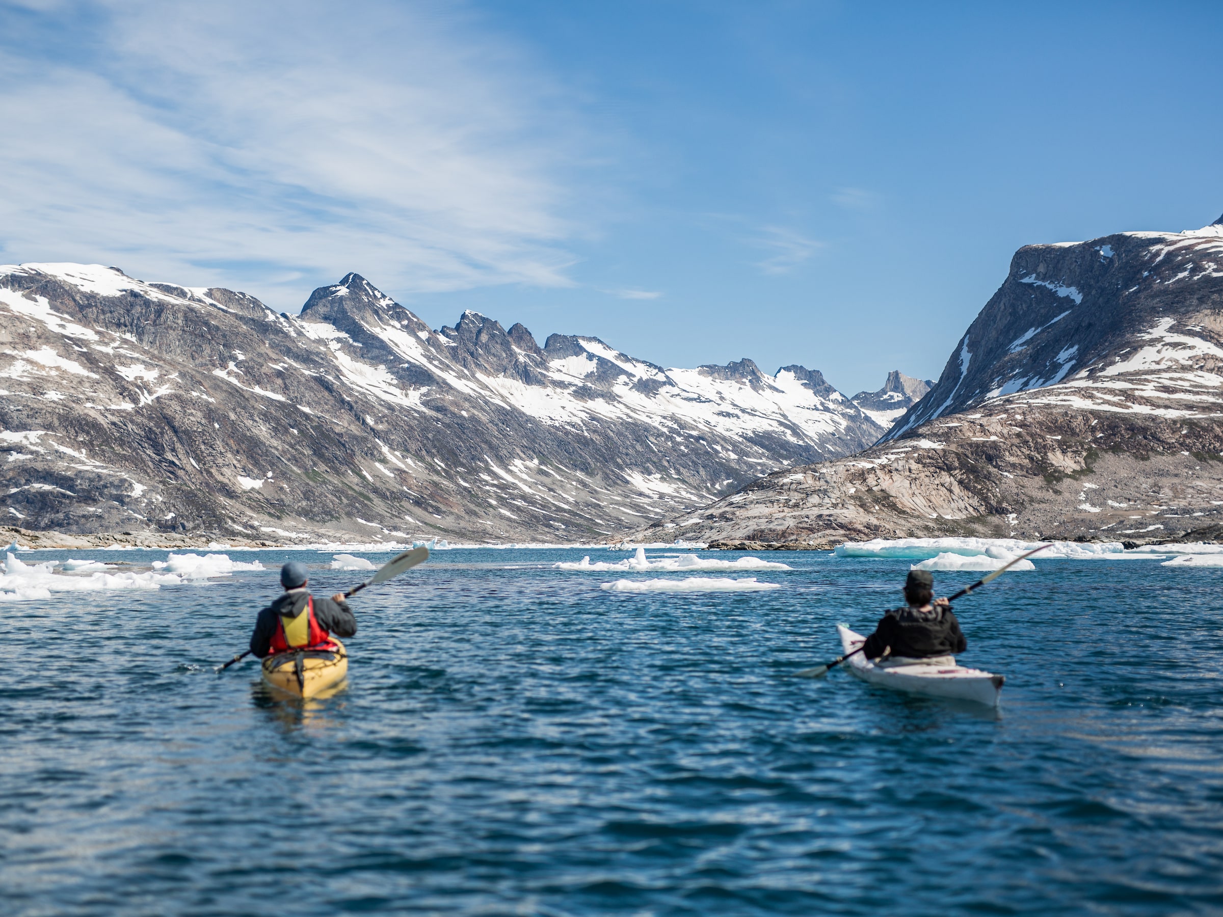 Kayaking in East Greenland. Photo by Aningaaq R Carlsen - Visit Greenland