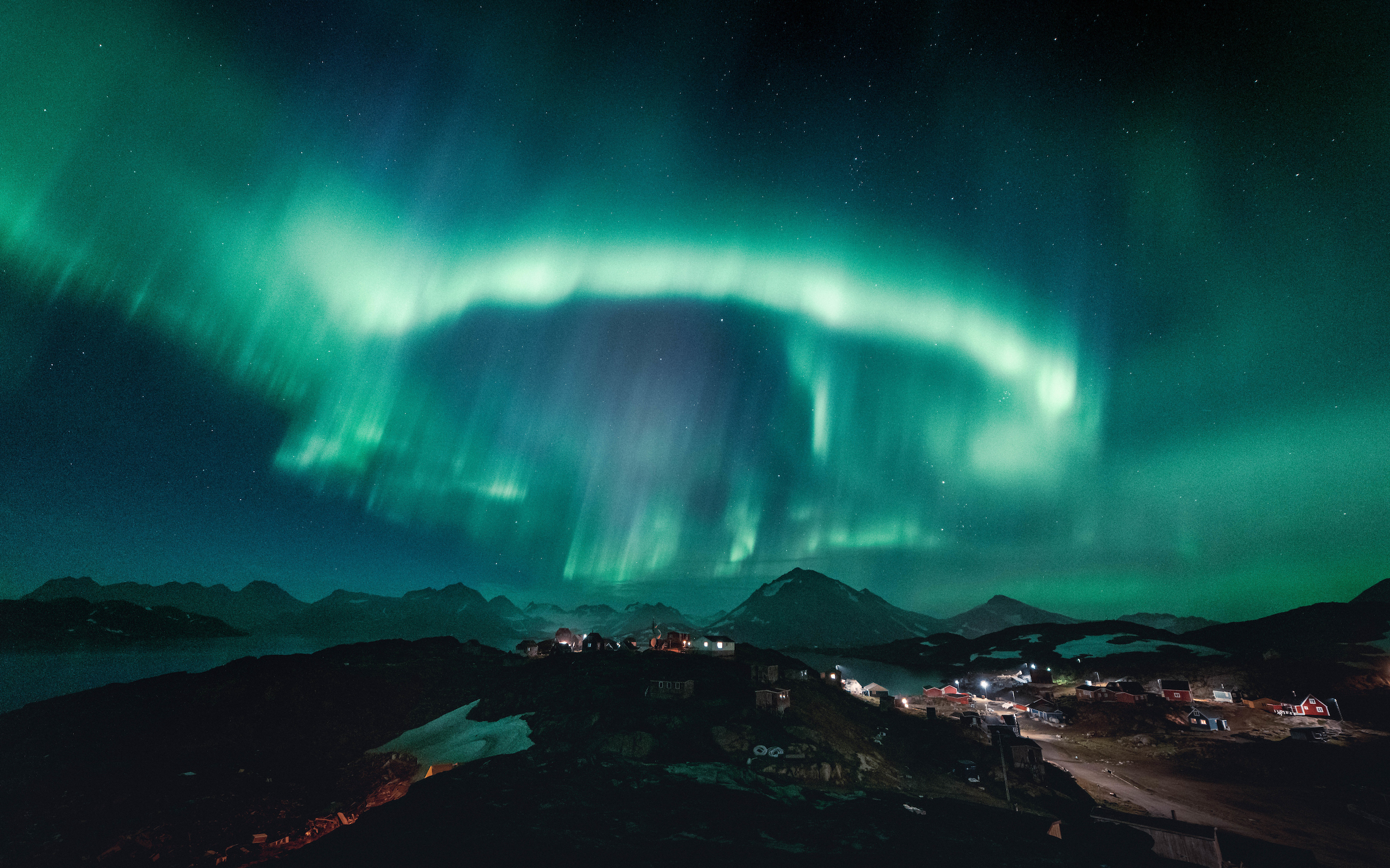 Northern sky disco over Kulusuk. Photo by Norris Niman - Visit Greenland