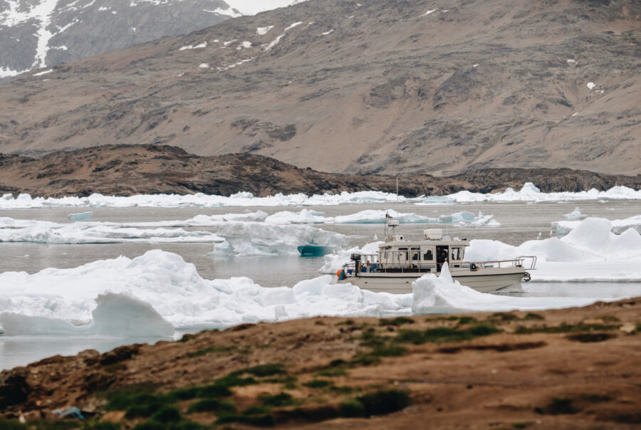Boat just outside Tasiilaq - VEG - 002 - Filip Gielda - Visit East Greenland