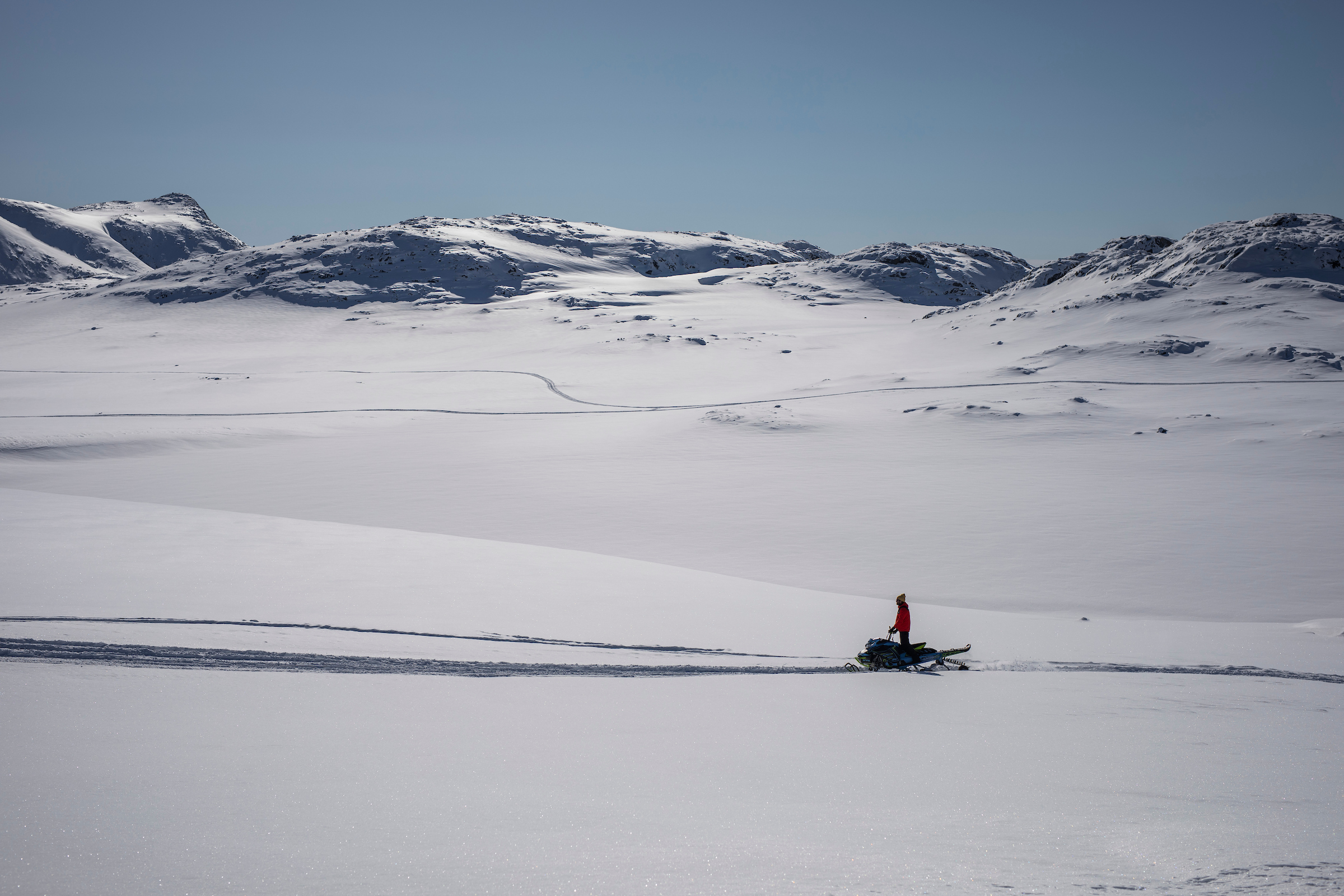 Snowmobile is the best transportation in the wintertime in Kulusuk. Photo by Aningaaq Rosing Carlsen - Visit Greenland