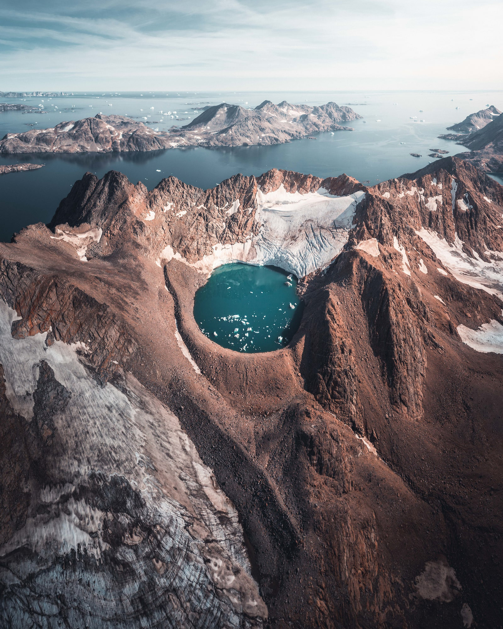 The blue lagoon in the hand of a mountain. Photo by Norris Niman - Visit Greenland
