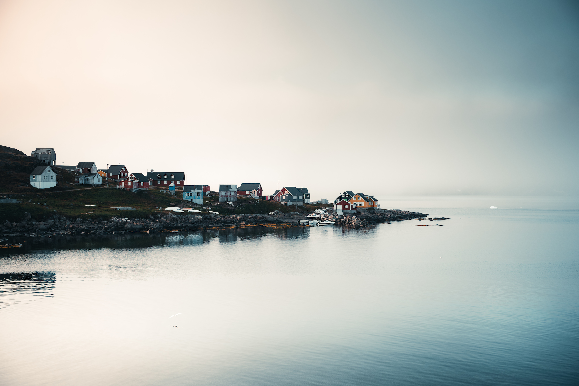 Where the town is the only thing separating the sky from the sea. Photo by Norris Niman - Visit Greenland